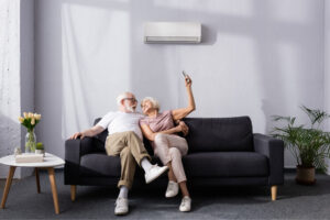 elderly couple in air conditioned room